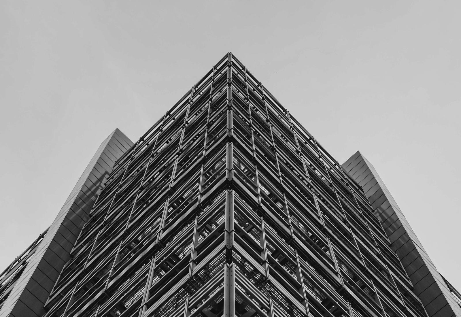 Angular facade of a civic tower rising to a point